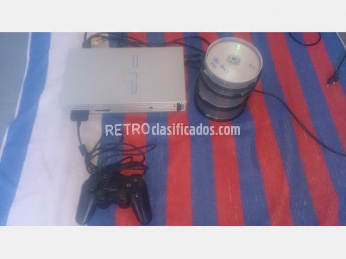 PS2 con chip matrix, mando y juegos