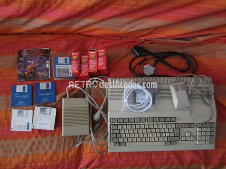 Amiga500 + juegos + cables. 1