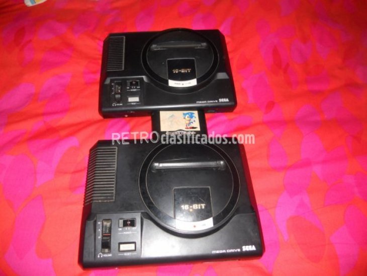 cambio lote de 2 megadrives x consola 1